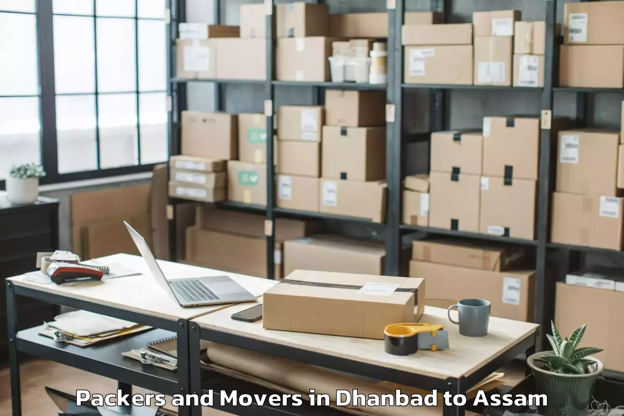 Professional Dhanbad to Srimanta Sankaradeva Universit Packers And Movers